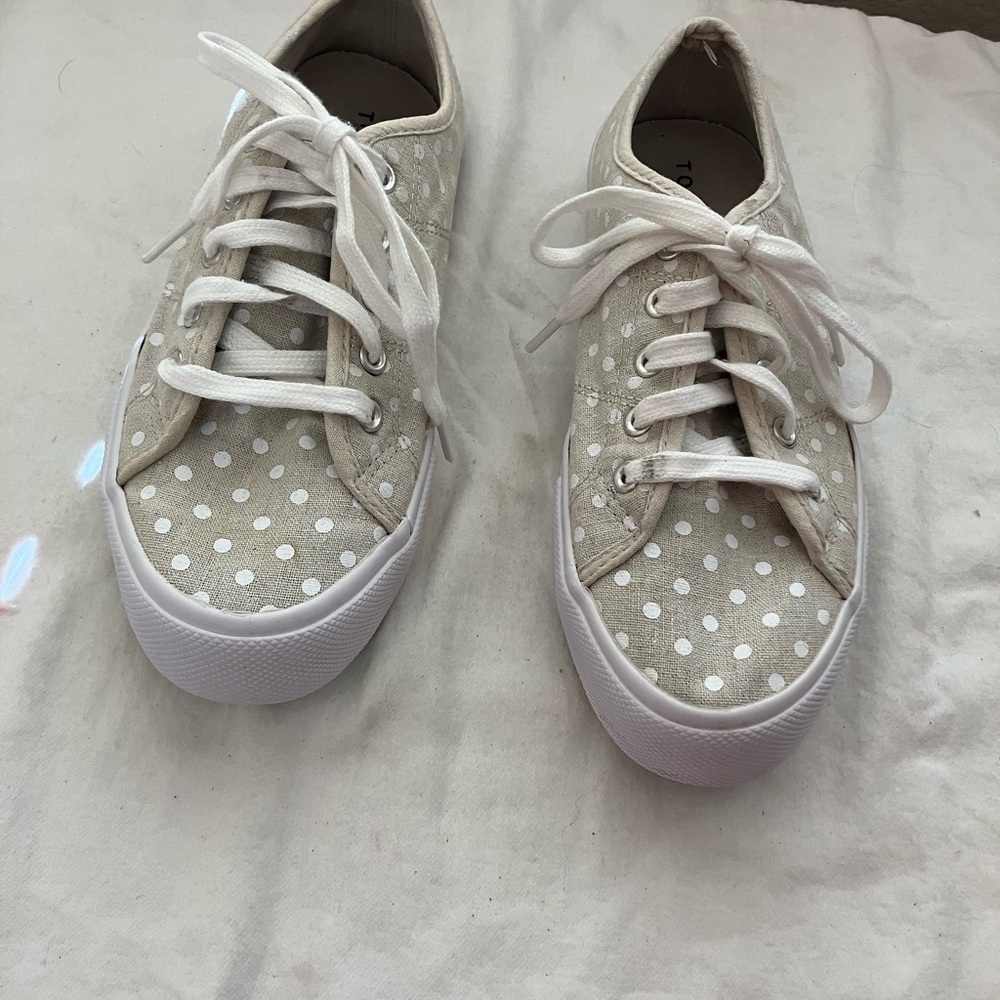 Torrid cream with white polka dots lace up sneakers in great condition. Size 8WW
